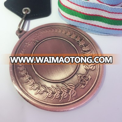 stamping iron medal with antique bronze finishing